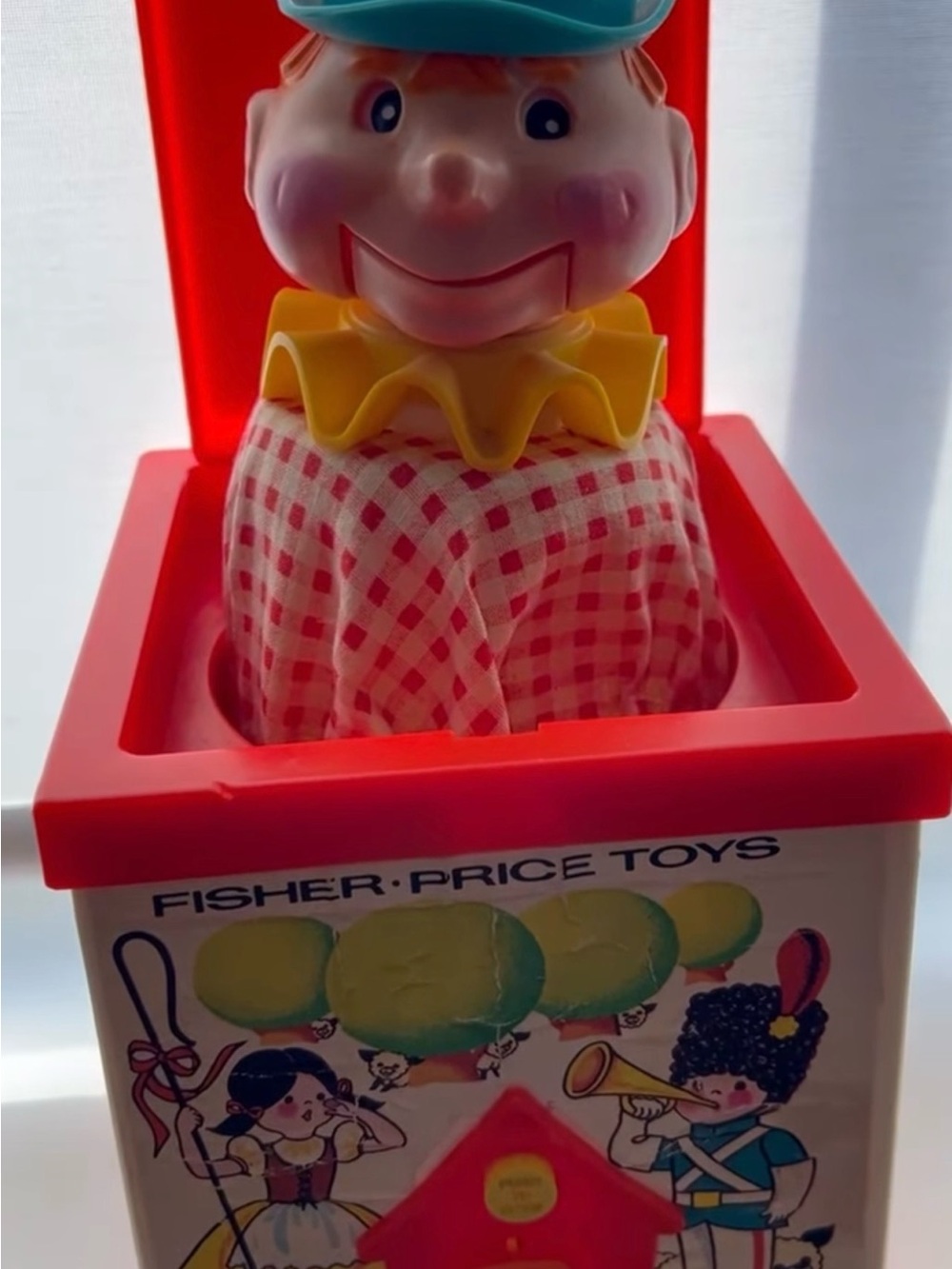 Fisher-Price Red Jack-in-the-Box Clown with Yellow Collar and Blue Hat